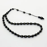 كوك اسود زيتونه بالمعدن 8 ملي 33 حبايه