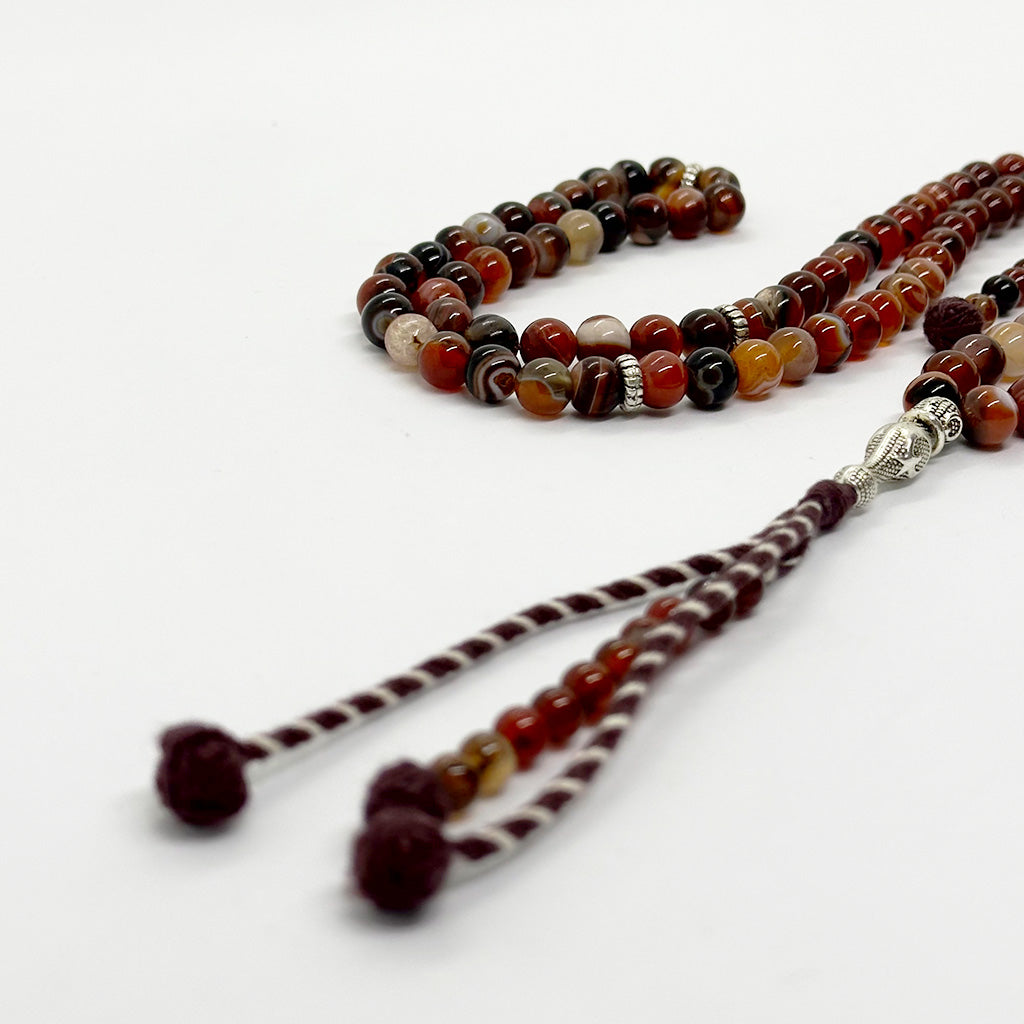 سبحه عقيق سليماني احمر 100 حبايه 8 ملي 2 عداد