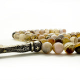 عقيق سليماني بني 100 حبايه 8 ملي 2 عداد