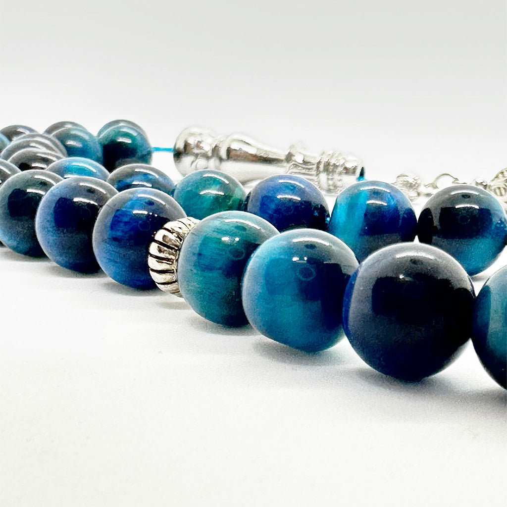 سبحة حجر عين النمر اازرق فاتح 10 ملي 33 حبايه