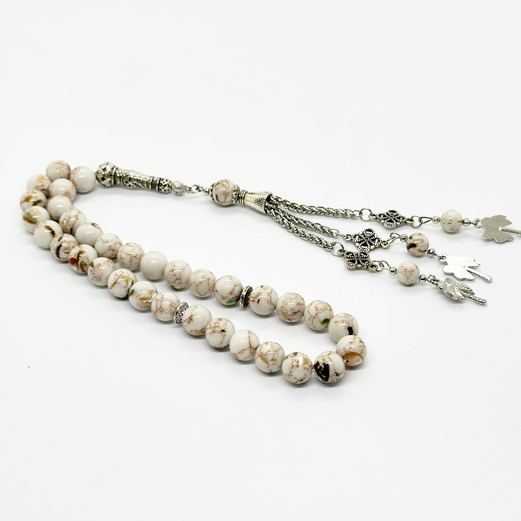 فيروز ابيض بصدف بحري 10 ملي 33 حبايه