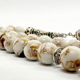 فيروز ابيض بصدف بحري 10 ملي 33 حبايه