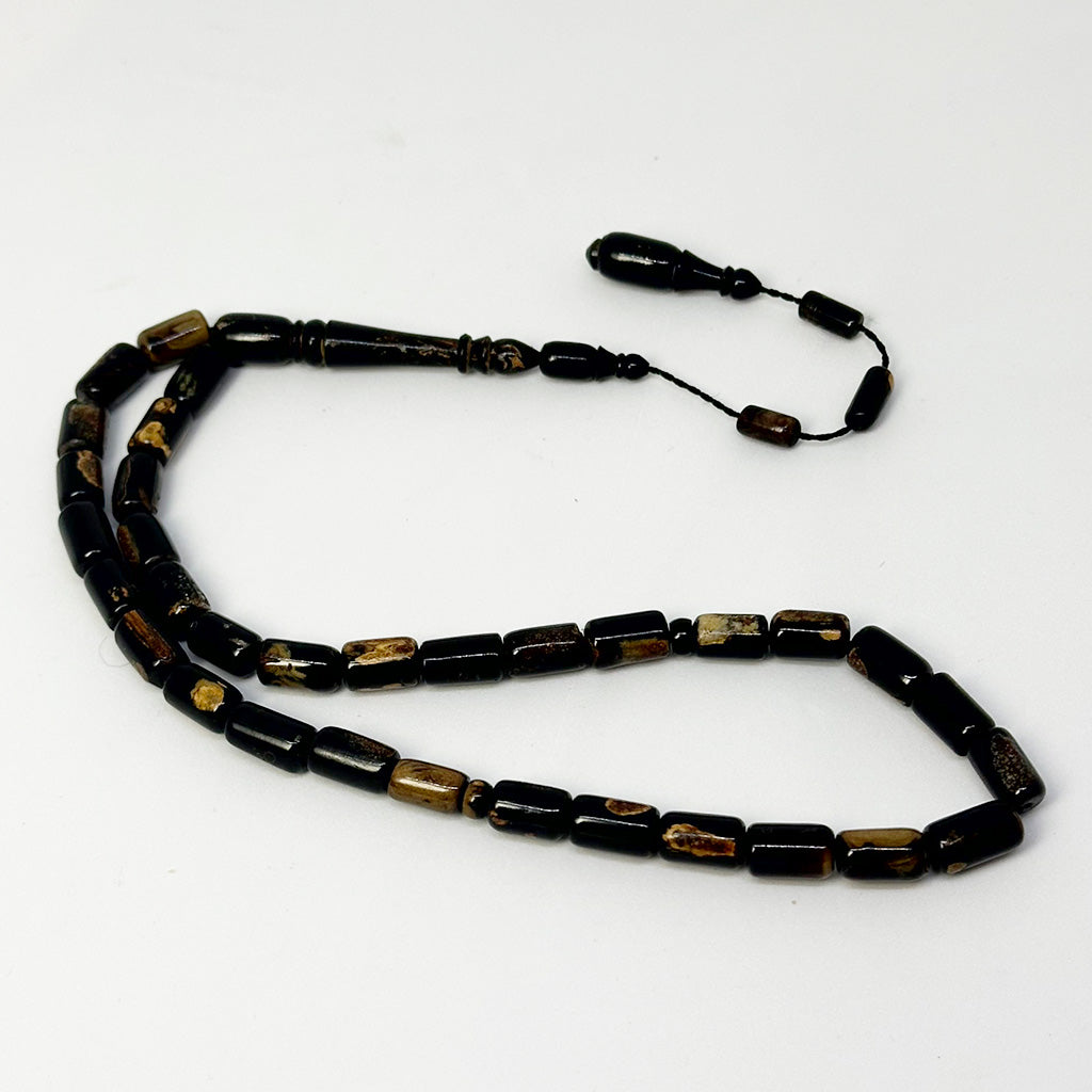 سبحة يسر بحر احمر برميلي 8 ملي 33 حبة