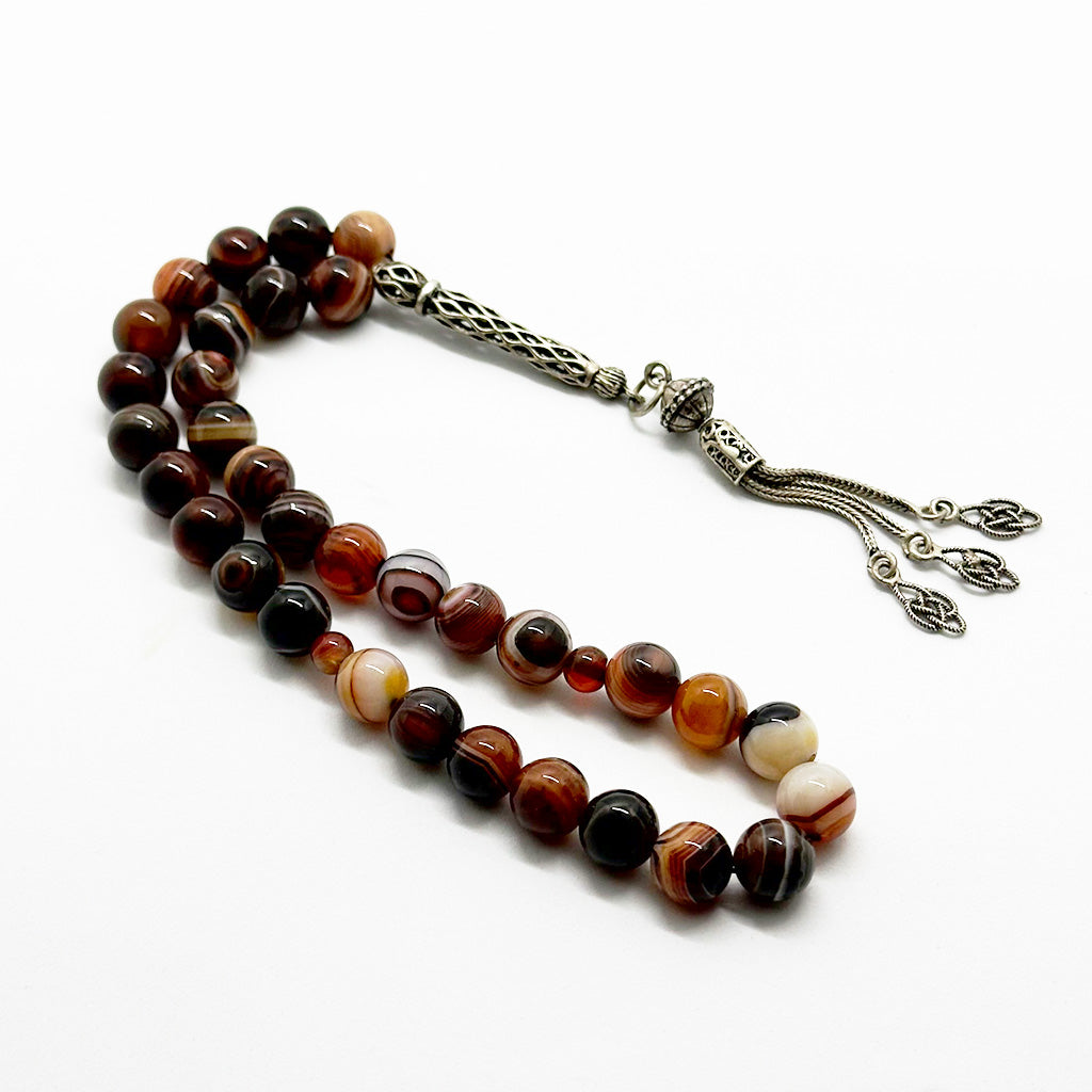 999 حجر عقيق سليماني عيون احمر  10 ملي 33 حبايه دلايه فضه